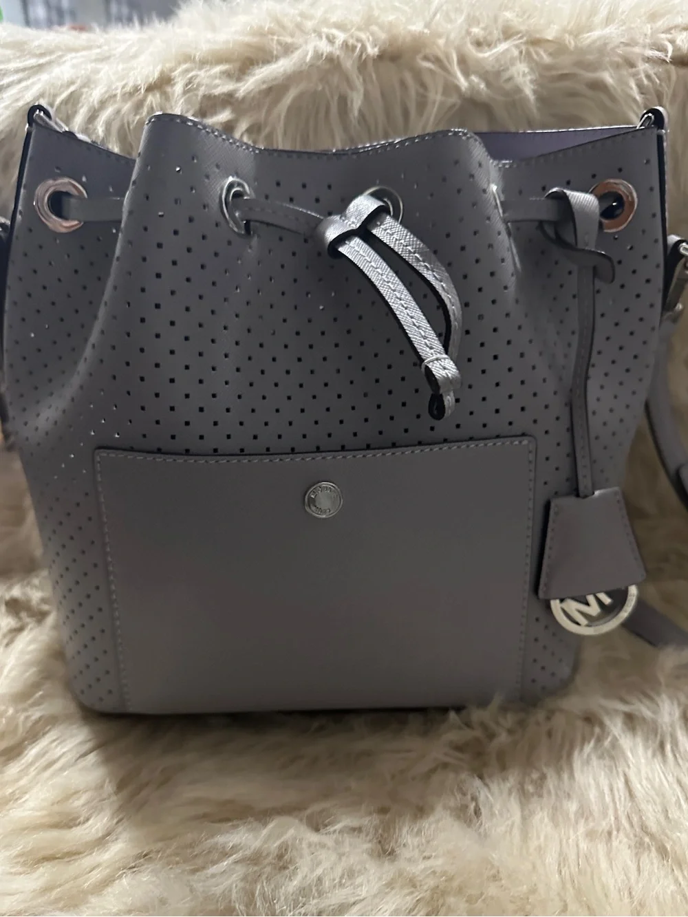 Michael Kors Perforated Drawstring Bucket Bag in Gray - Picture 2 of 5